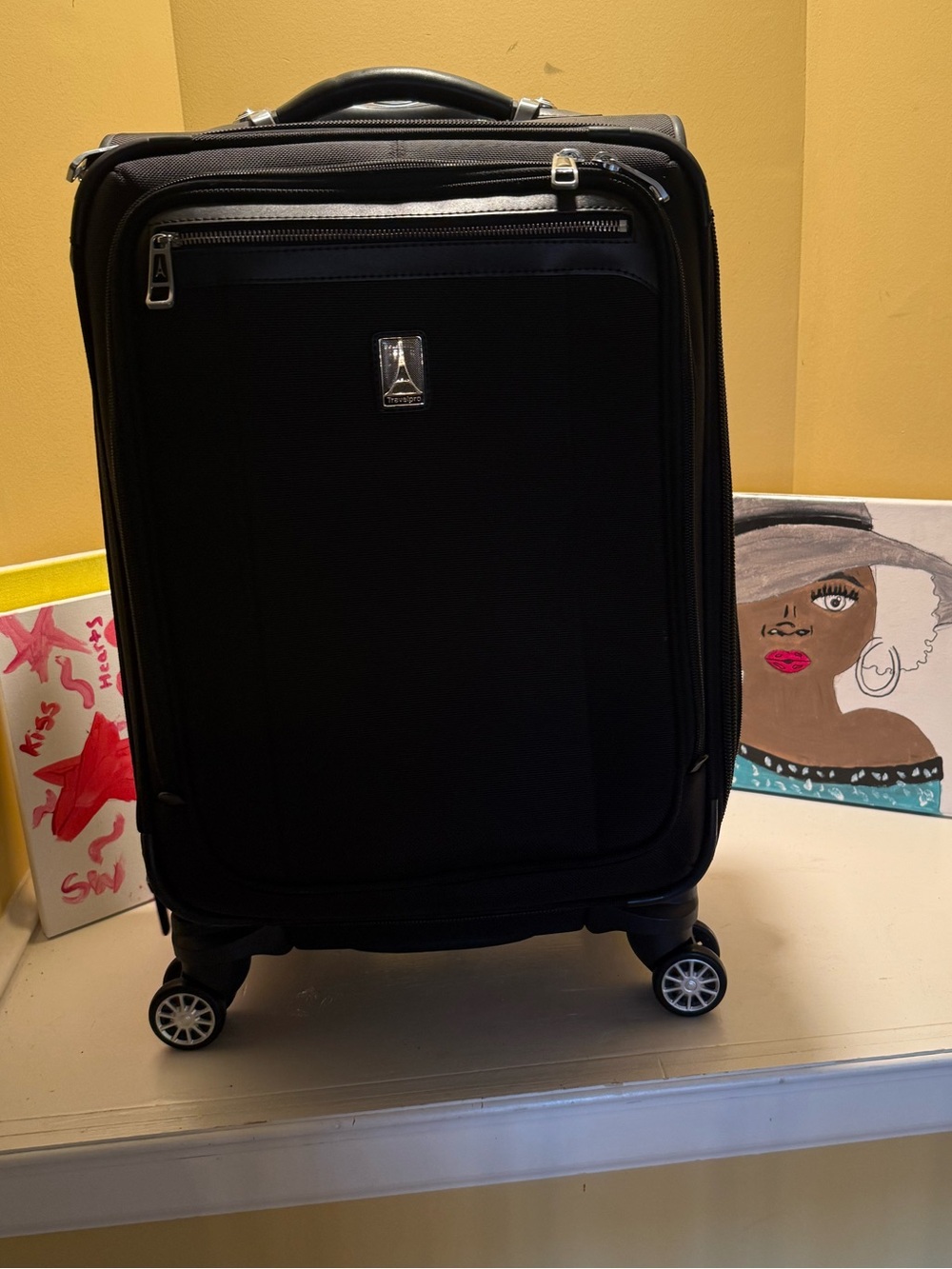 Travel pro elite 21 inch Black Carry-On Spinner Suitcase with Telescoping Handle
